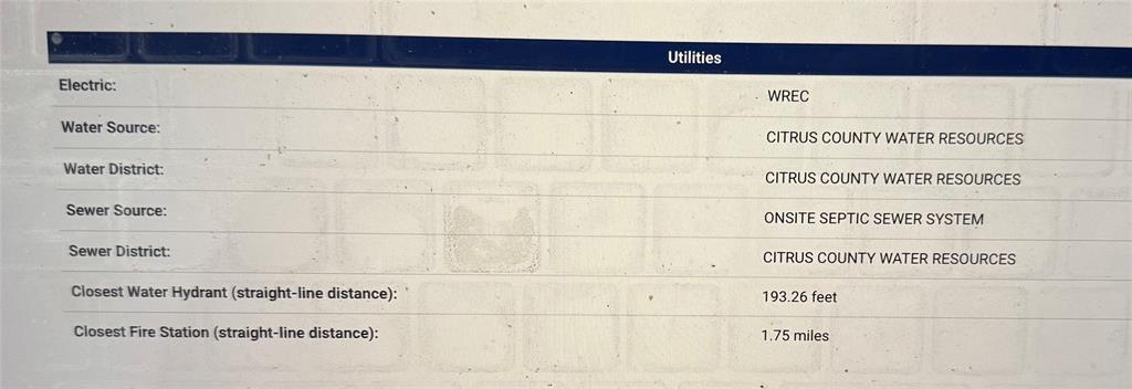 This image shows a table listing utility information for a property — 8282 N BROOK WAY, CITRUS SPRINGS, FL