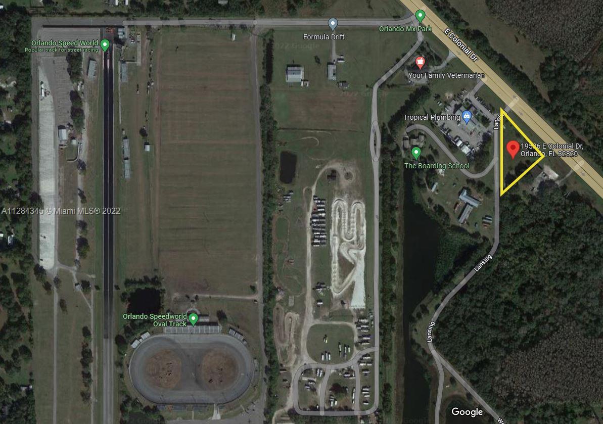 This is an aerial map showing a property location near Orlando Speedworld and local businesses — 19536 E Colonial Dr, Orlando FL 32820, ORLANDO, FL