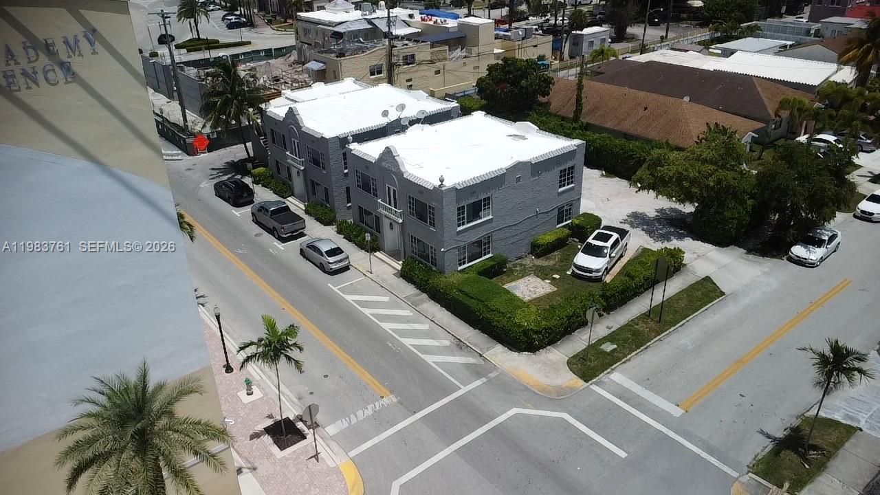 An aerial view shows a gray two-story apartment building with a white roof — 223 S 17th Ave # 2, Hollywood FL 33020, HOLLYWOOD, FL