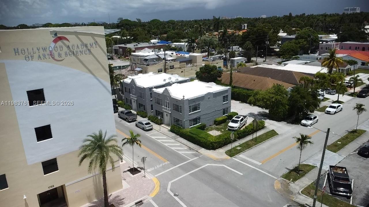 An aerial view shows a school building next to a gray apartment complex and street — 223 S 17th Ave # 2, Hollywood FL 33020, HOLLYWOOD, FL