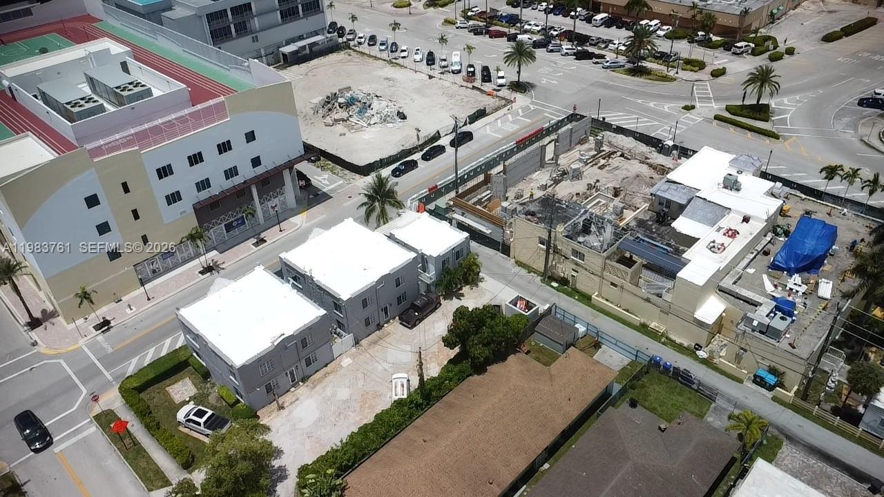 An aerial view shows a construction site, nearby residential buildings, and a large parking lot — 223 S 17th Ave # 2, Hollywood FL 33020, HOLLYWOOD, FL