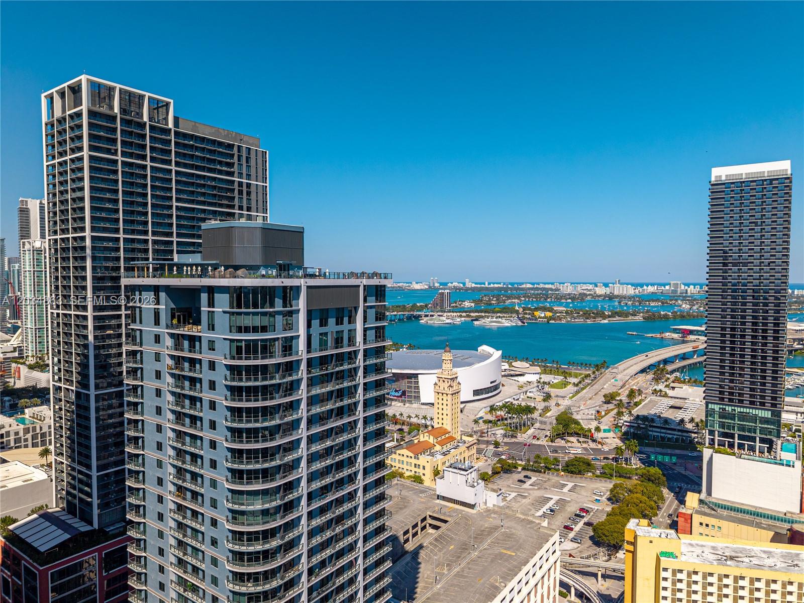 High-rise residential buildings overlook the Kaseya Center and Biscayne Bay in downtown Miami — 121 NE 5th St # 2211, Miami FL 33132, MIAMI, FL