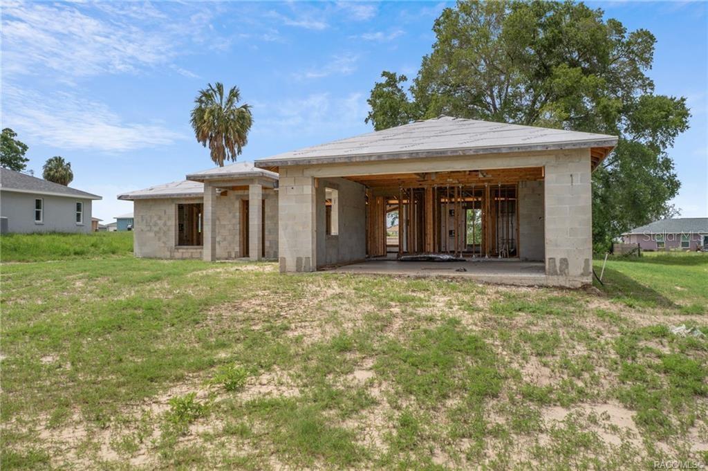 A partially constructed single-story house with concrete block walls and an unfinished roof — 4525 E REJOICE STREET, INVERNESS, FL