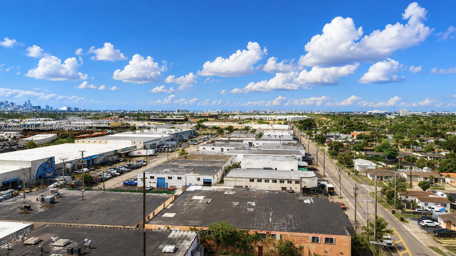 An aerial view shows a commercial industrial area with flat-roofed warehouses and nearby residential streets — 455 E 10th Ave, Hialeah FL 33010, HIALEAH, FL