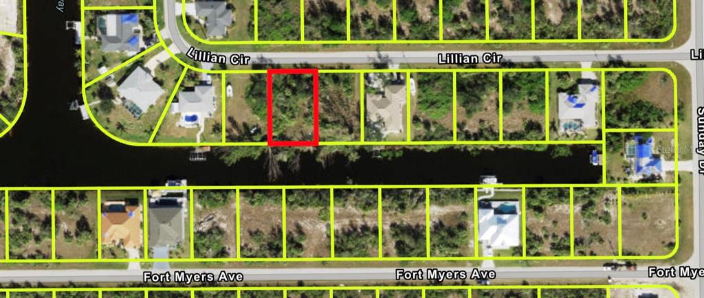 This is an aerial map showing a vacant lot outlined in red along a canal — 14526 LILLIAN CIRCLE, PORT CHARLOTTE, FL