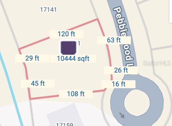 This is a map showing the property boundaries and dimensions of a residential lot — 17151 PEBBLEWOOD LANE, PUNTA GORDA, FL
