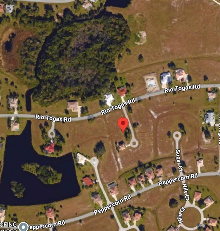This is a satellite map view of a residential neighborhood with houses and streets — 17151 PEBBLEWOOD LANE, PUNTA GORDA, FL