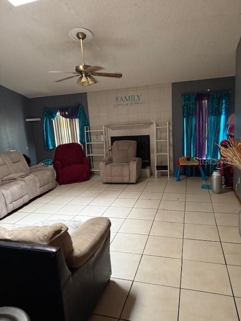 A living room features light-colored tile flooring, a ceiling fan, and a fireplace with shelving — 3424 ALISSA COURT, ORLANDO, FL