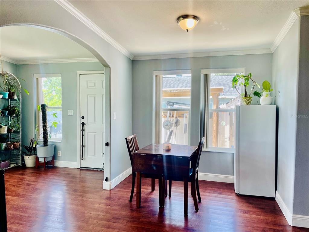 A single-story gray house with a purple double front door and a front deck — 653 LAKE MOBILE DRIVE, ALTAMONTE SPRINGS, FL