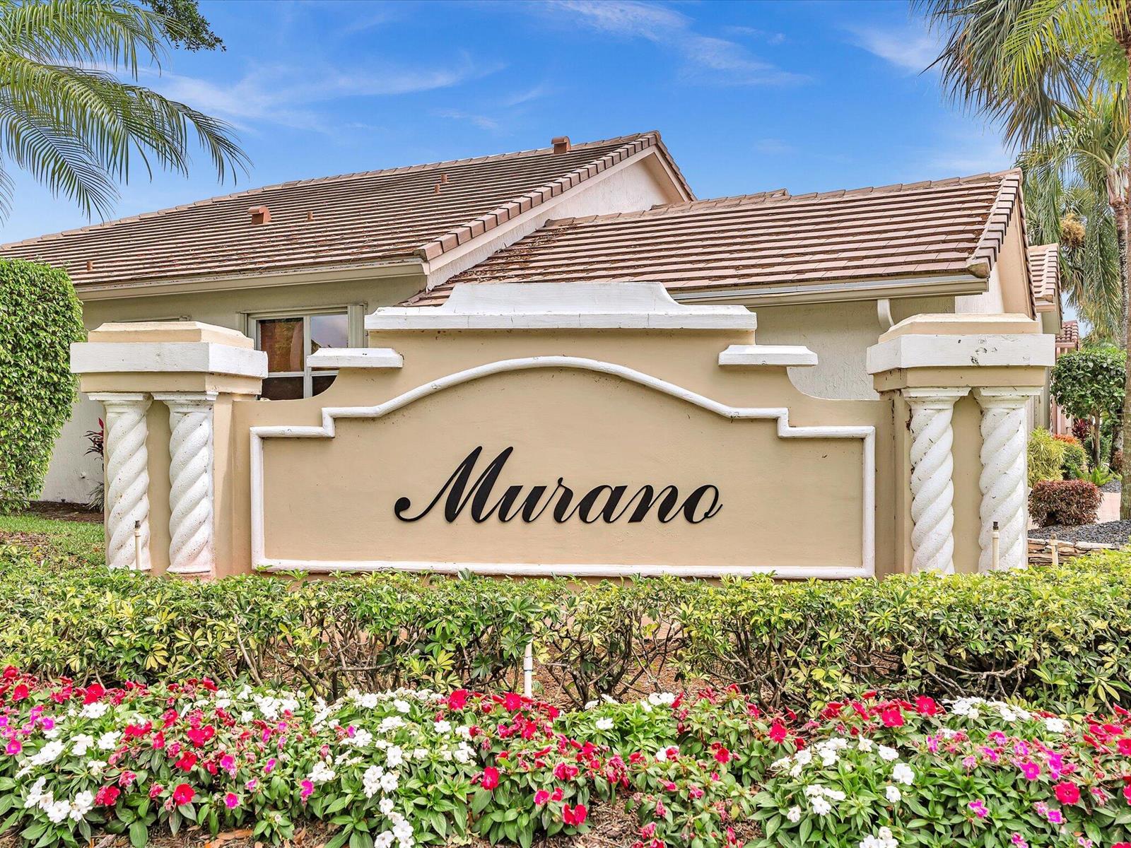 A beige monument sign with the word Murano stands in front of a house — 8901 Agliana Circle, Boynton Beach FL 33472, BOYNTON BEACH, FL