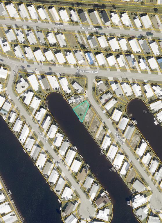 This is an aerial map showing a vacant lot highlighted in a residential neighborhood — 504 CLARION PLACE, NORTH PORT, FL