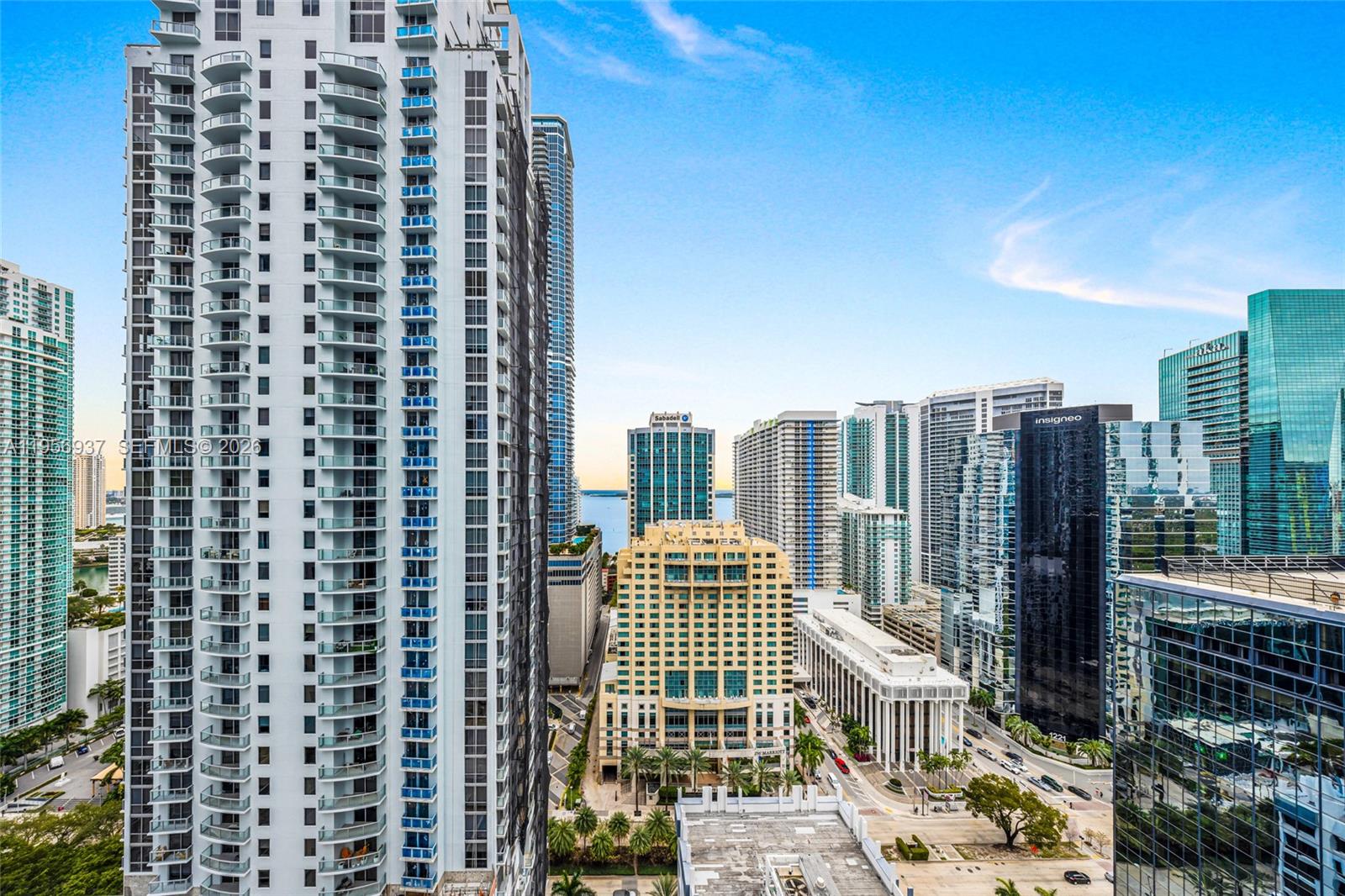 An elevated view of a dense urban skyline featuring numerous high-rise residential and office buildings — 1080 Brickell Ave # 2708, Miami FL 33131, MIAMI, FL