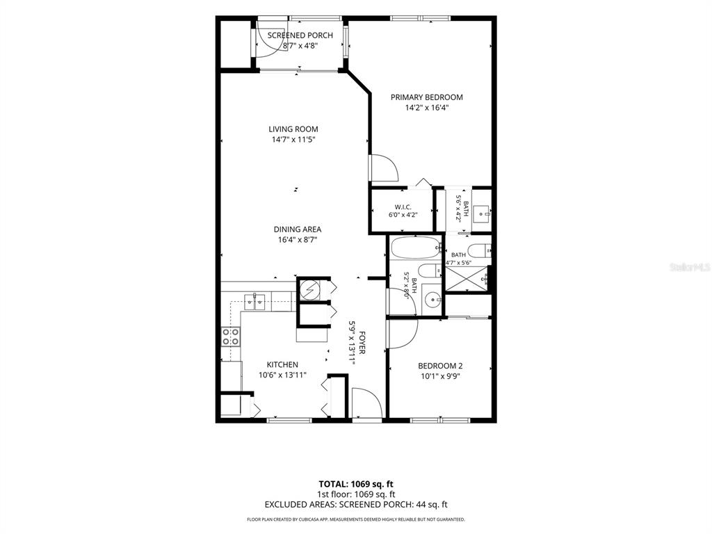 This is a floor plan for a 1,069-square-foot residential unit with two bedrooms and two bathrooms — 4908 MYRTLE OAK DRIVE UNIT 12, NEW PORT RICHEY, FL