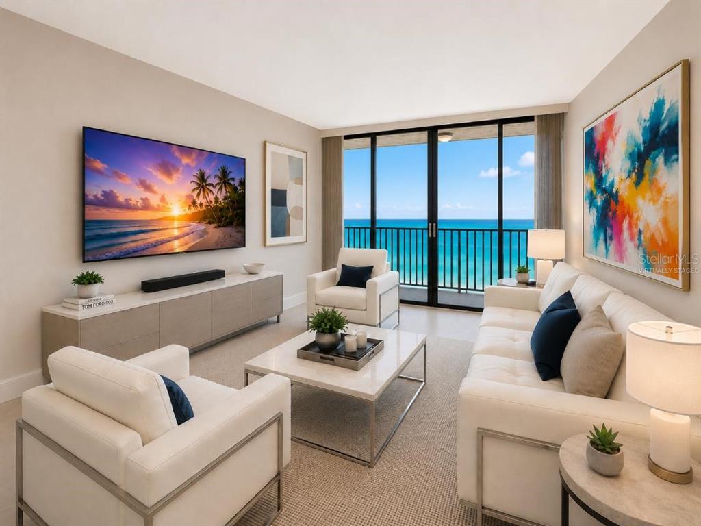 A living room features white furniture, a large television, and a balcony overlooking the ocean — 1290 GULF BOULEVARD UNIT 2003, CLEARWATER BEACH, FL