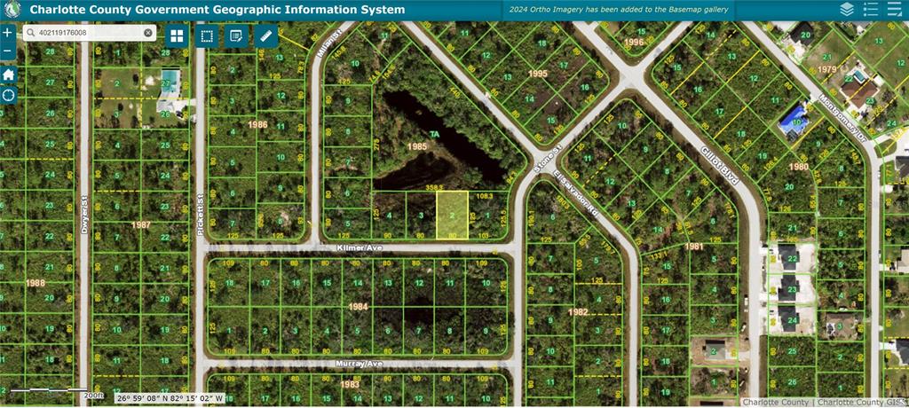 This is a satellite map showing a vacant residential lot highlighted in yellow — 12188 KILMER AVENUE, PORT CHARLOTTE, FL