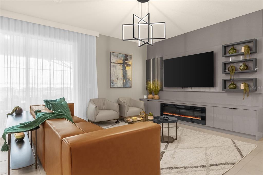 A modern living room features a leather sofa, two armchairs, a fireplace, and a chandelier — 3048 MAHALO DRIVE, DAVENPORT, FL