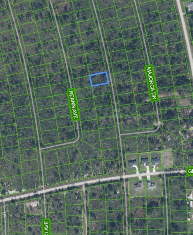 An aerial map shows a highlighted rectangular plot of land surrounded by undeveloped wooded lots — 4401 OBISPO AVENUE, SEBRING, FL