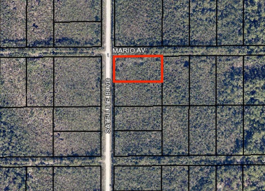 This is an aerial map showing a rectangular plot of land outlined in red — 2801 Satellite Blvd., Cocoa FL 32926, COCOA, FL