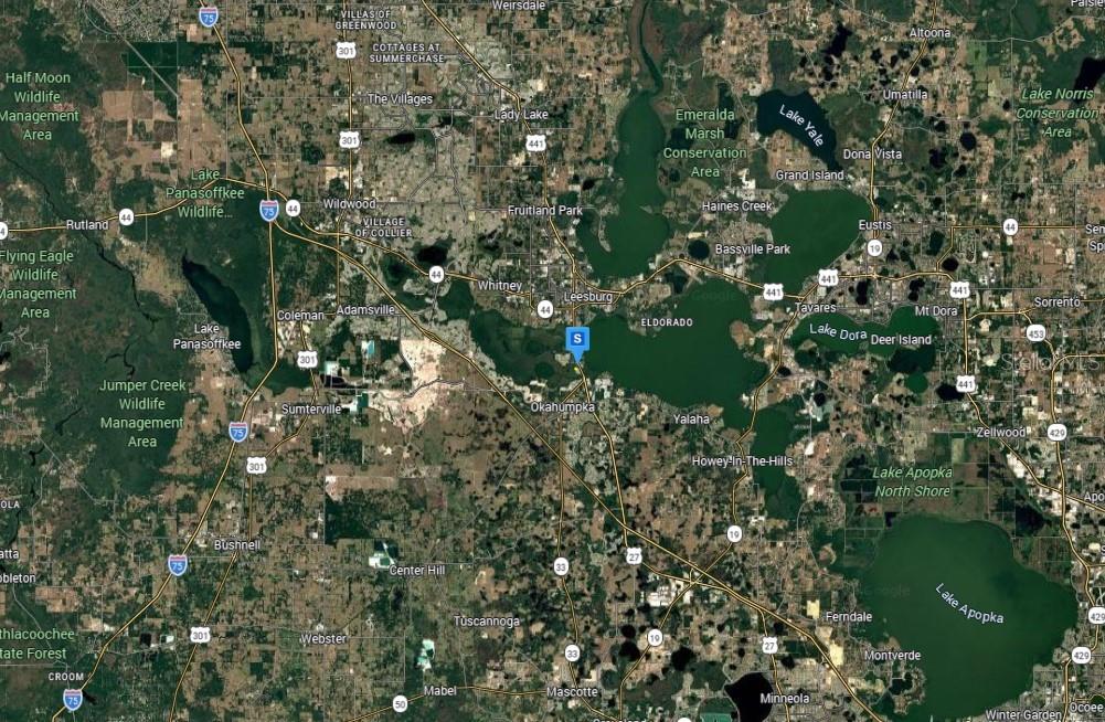 This is a satellite map showing the region surrounding Leesburg, Florida — 28915 HUBBARD STREET, LEESBURG, FL