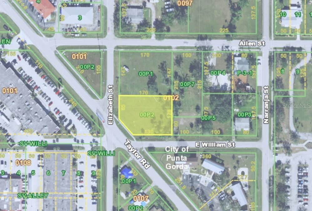 This is a map showing a highlighted parcel of land in a residential area — 1226 TAYLOR ROAD, PUNTA GORDA, FL