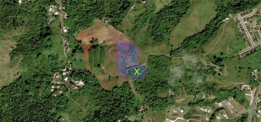 This aerial map shows a highlighted parcel of land with a yellow X marking a section — KM 0.2 INT Bo. Helechal PR 152, BARRANQUITAS, PR