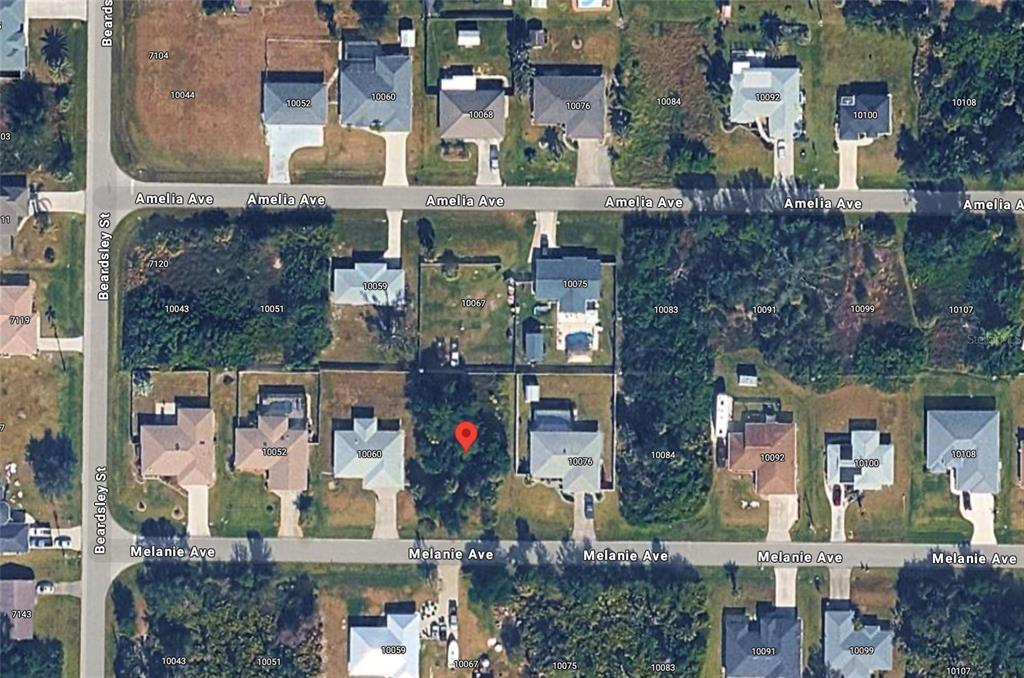 This is an aerial map view of a residential neighborhood with houses and streets — 10068 MELANIE AVENUE, ENGLEWOOD, FL