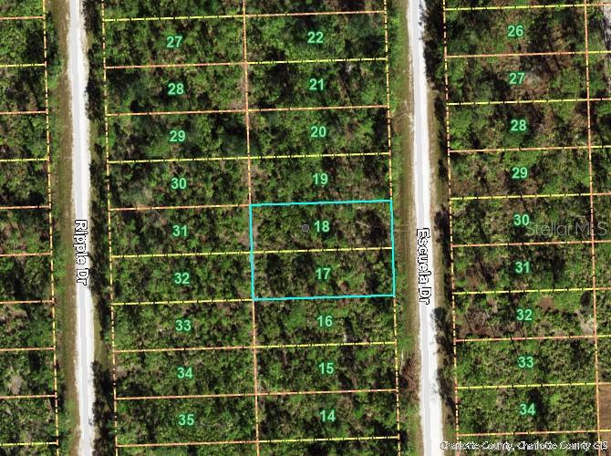 This aerial map shows two highlighted adjacent land parcels numbered 17 and 18 — 12297 ESCUELA DRIVE, PUNTA GORDA, FL