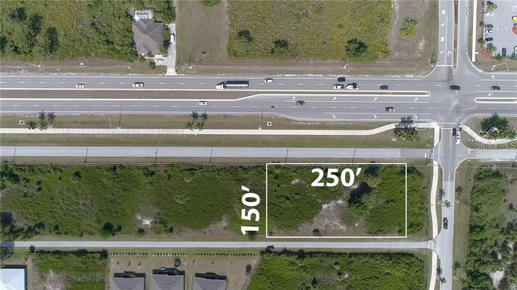 This aerial view shows a vacant rectangular lot measuring 250 feet by 150 feet — 8420 WILTSHIRE DRIVE, PORT CHARLOTTE, FL