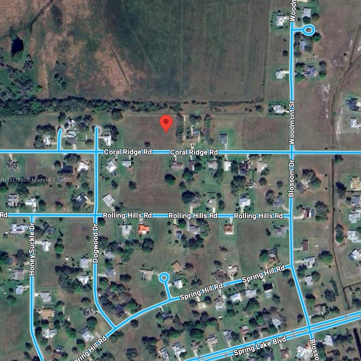 This is an aerial map view of a residential area with a red location pin — 7109 Coral Ridge Rd, Sebring FL 33876, SEBRING, FL