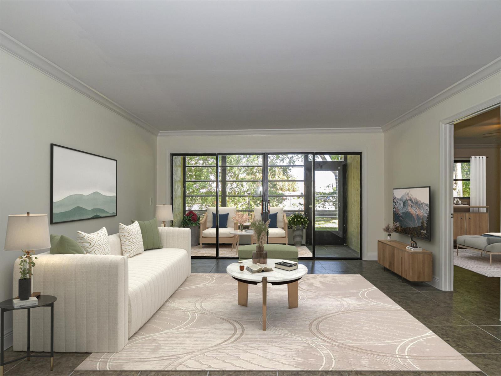 This rendering shows a living room with a white sofa, round coffee table, and patio doors — 400 18th Street # G2, Vero Beach FL 32960, VERO BEACH, FL