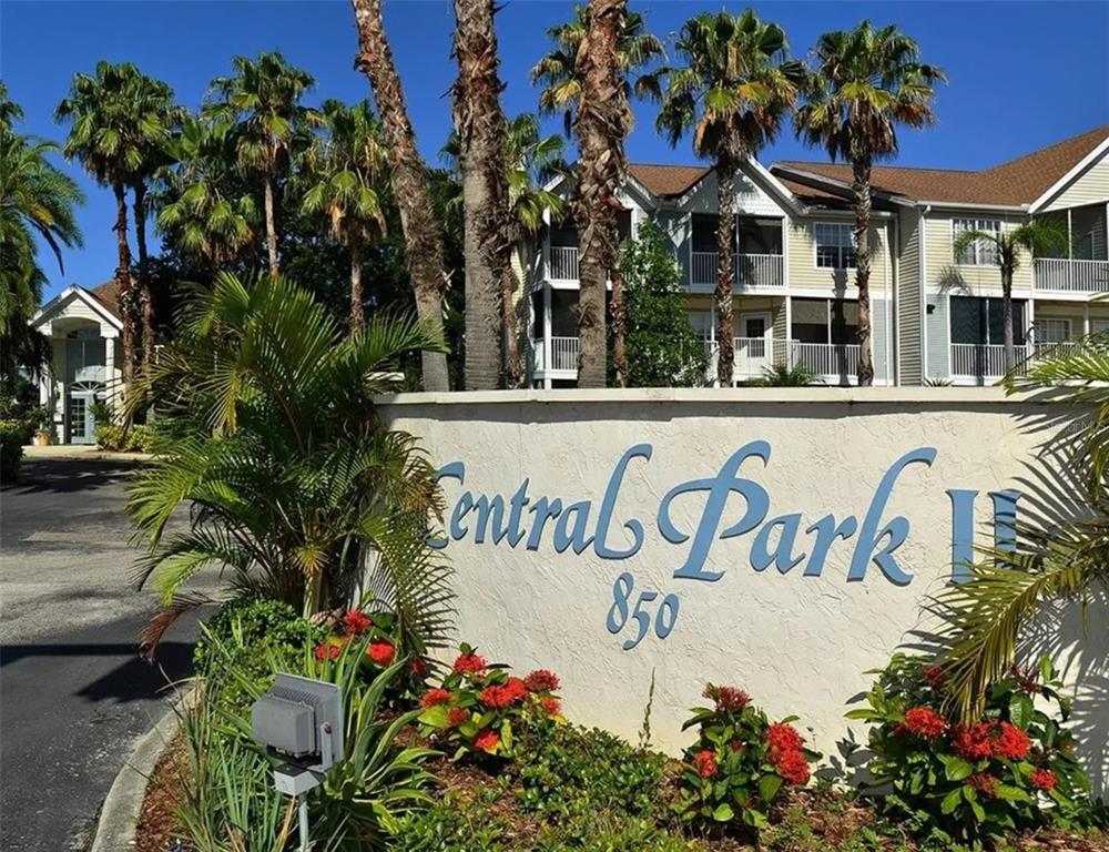 A sign for Central Park II stands in front of multi-story apartment buildings and palm trees — 850 S TAMIAMI TRAIL UNIT 801, SARASOTA, FL