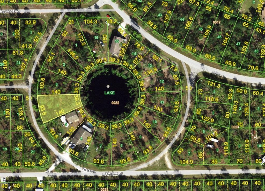 This is a property map showing residential lots arranged in a circle around a lake — 12507 VISTA CIRCLE, PUNTA GORDA, FL