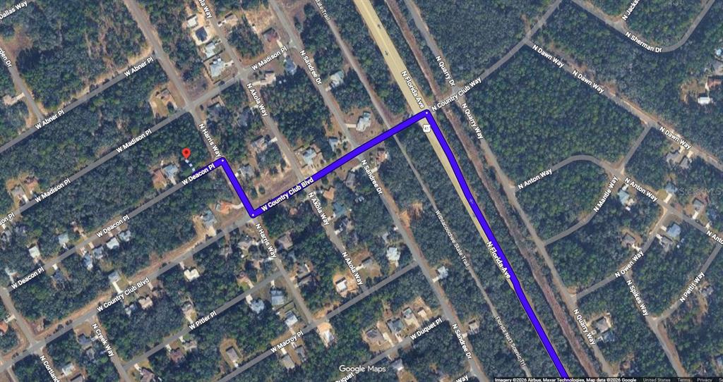 This is an aerial map showing a property location highlighted with a blue route — 731 W DEACON PLACE, CITRUS SPRINGS, FL