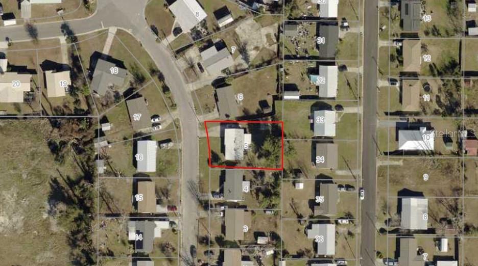 This aerial map shows a residential property highlighted in red among surrounding houses and streets — 810 FORESTDALE AVENUE, PANAMA CITY, FL