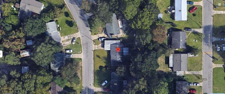 This is an aerial view of a residential property and surrounding neighborhood streets — 810 FORESTDALE AVENUE, PANAMA CITY, FL