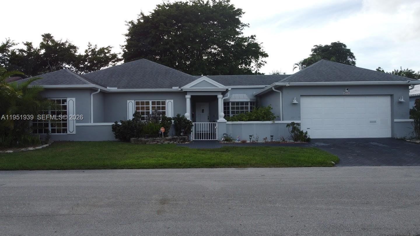 4511 Queen Palm Ln, Tamarac FL 33319