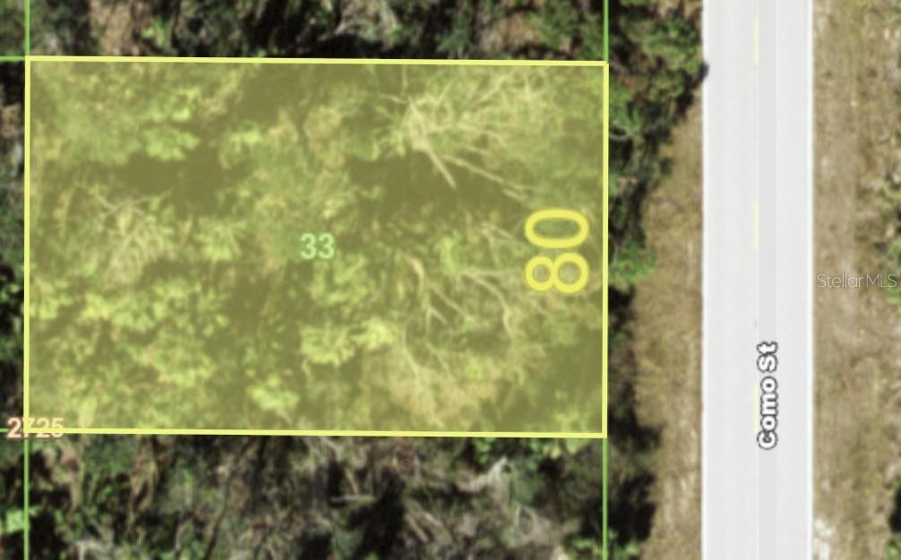 This is a map showing a rectangular plot of land adjacent to a paved road — 3115 COMO STREET, PORT CHARLOTTE, FL