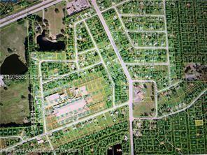 This is an aerial map view of a residential neighborhood with outlined property lots — 811 Yellowtail Lane, Punta Gorda FL 33982, PUNTA GORDA, FL