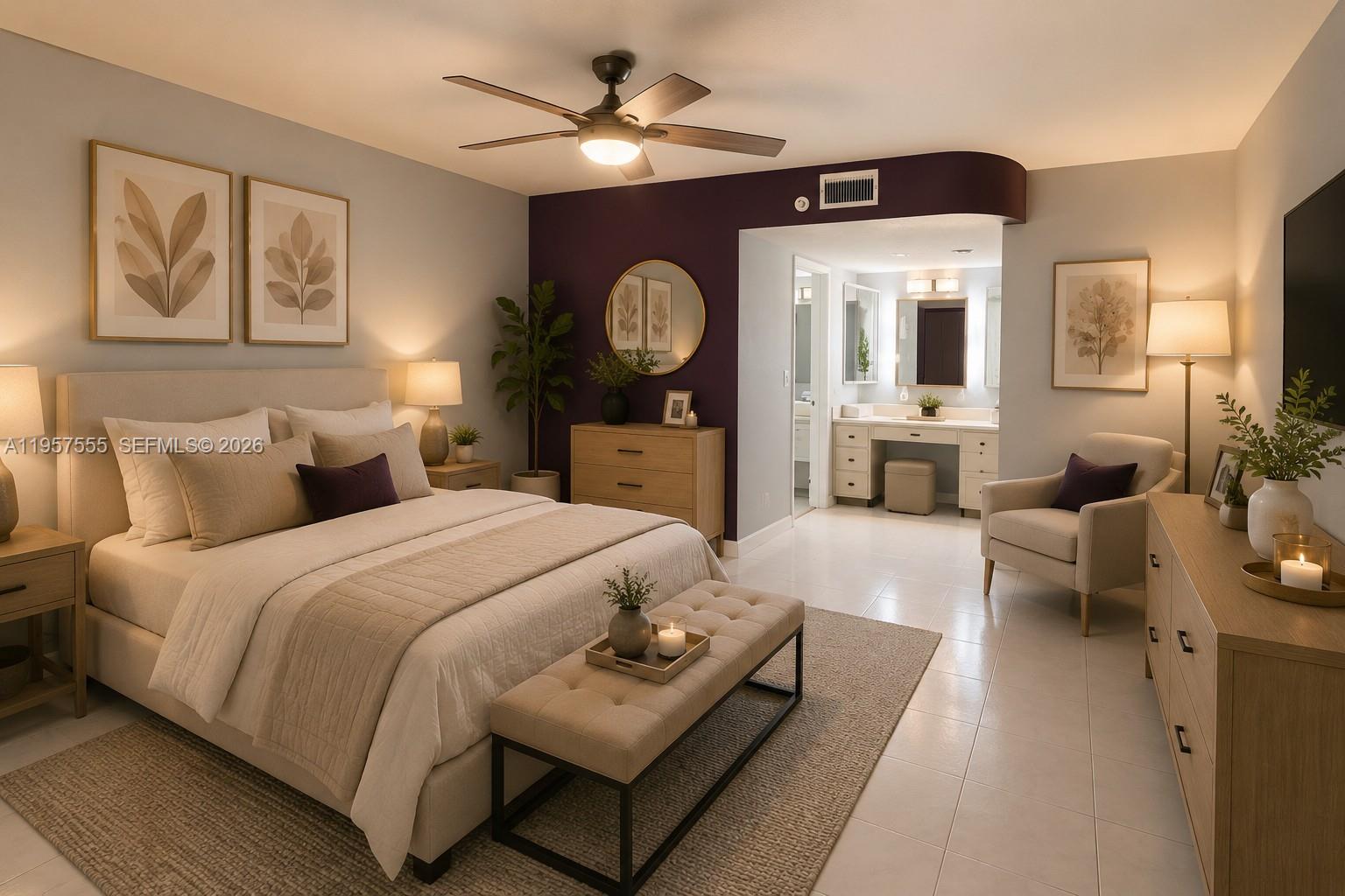 A bedroom features a bed with a bench, a dresser, and an attached vanity area — 3910 Inverrary Blvd # B, Lauderhill FL 33319, LAUDERHILL, FL