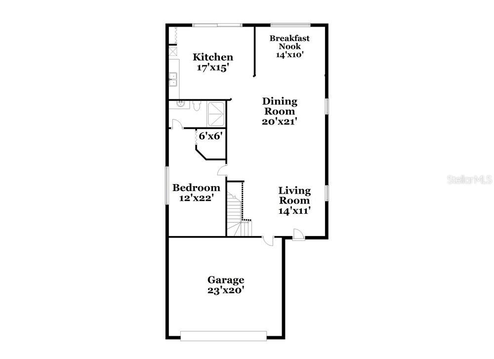 This is a floor plan of a home featuring a kitchen, dining room, and garage — 18034 BIRDWATER DRIVE, TAMPA, FL