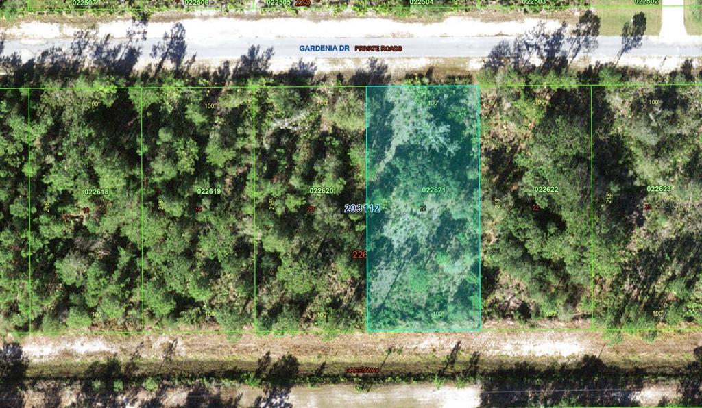 This aerial map shows a rectangular, wooded residential lot highlighted in blue — 4311 GARDENIA DRIVE, INDIAN LAKE ESTATES, FL