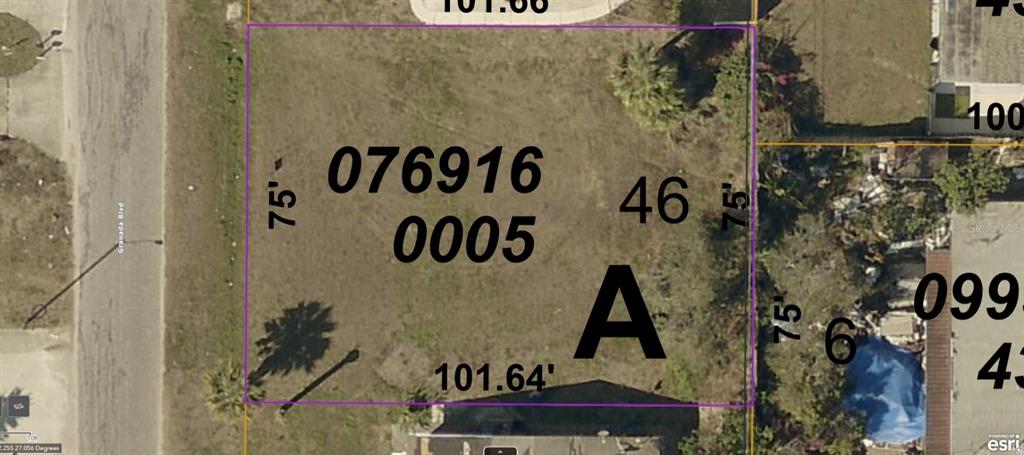 This is a satellite map view of a rectangular vacant residential lot — GRANADA BOULEVARD, NORTH PORT, FL