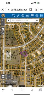 This is a satellite map showing a highlighted parcel of land in a residential neighborhood — 0 TORGERSON STREET, NORTH PORT, FL