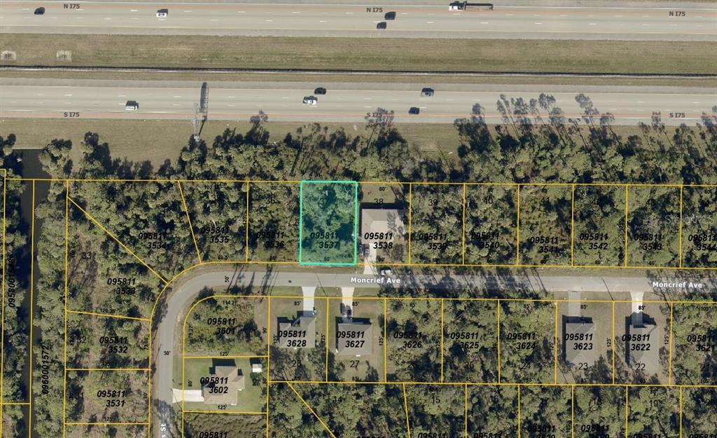 This is an aerial map showing residential lots and a highway — MONCRIEF AVENUE, NORTH PORT, FL