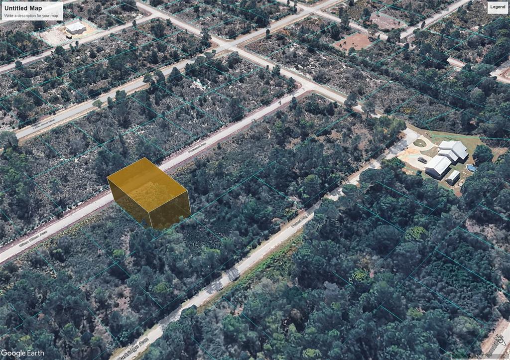 An aerial view shows a vacant, wooded lot highlighted in purple along a paved road — 3413 PHEASANT AVENUE, LAKE PLACID, FL