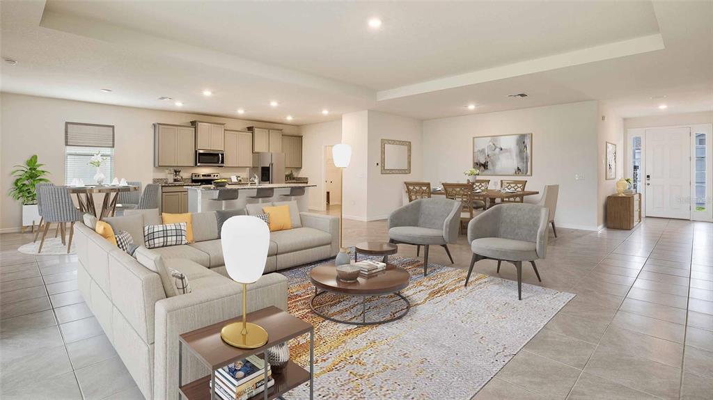 This is a digital rendering of an open-concept living room, dining area, and kitchen — 304 158TH STREET E, BRADENTON, FL