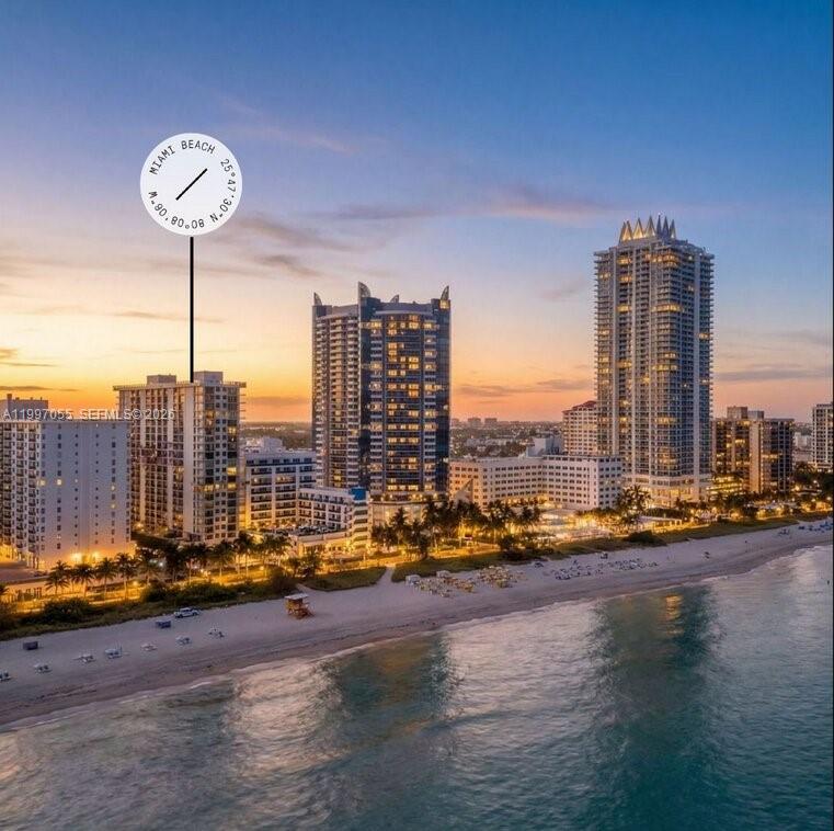 An aerial view of a Miami Beach coastline featuring several high-rise residential buildings at sunset — 6061 Collins Ave # 5F, Miami Beach FL 33140, MIAMI BEACH, FL