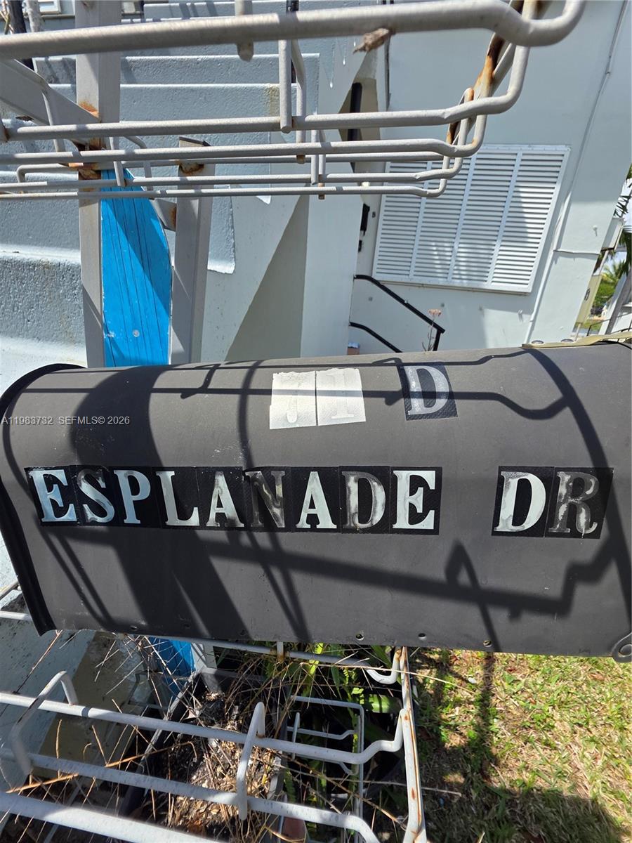A close-up view of a black mailbox labeled with the street name Esplanade Dr — 71 Esplanade Dr # D, Miami Springs FL 33166, MIAMI SPRINGS, FL