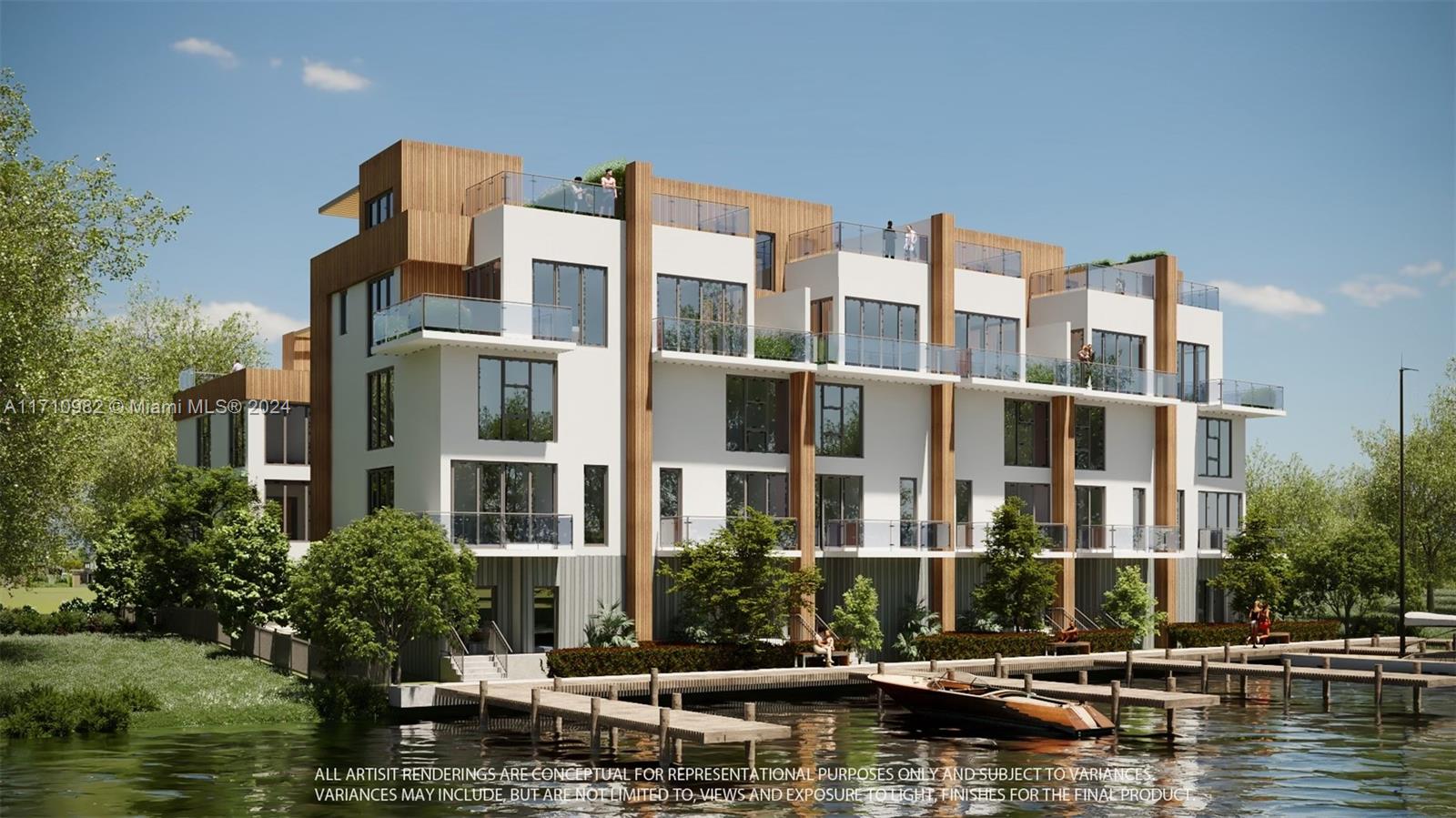 A multi-story residential building under construction features balconies and private docks along the water — 2005 Calais Dr # 1, Miami Beach FL 33141, MIAMI BEACH, FL