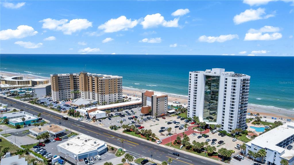 An aerial view shows two large beachfront hotels separated by a road and parking lots — 2425 S ATLANTIC AVENUE UNIT 4060, DAYTONA BEACH, FL